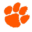 Honaker Tigers Logo - an orange tiger paw print with white outline